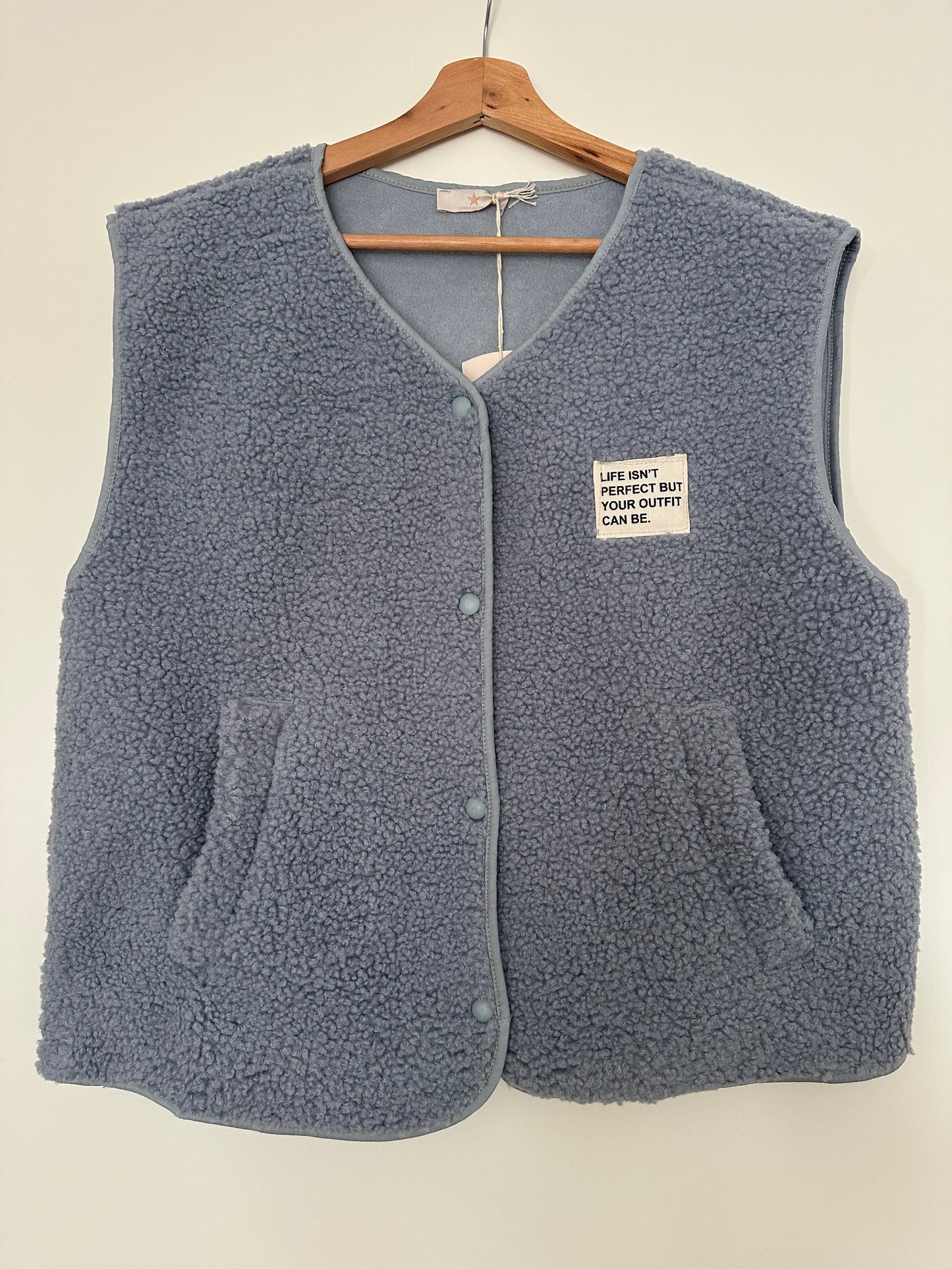 Gilet Gaby moumoute sans manches bleu clair